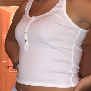 Four button white tank